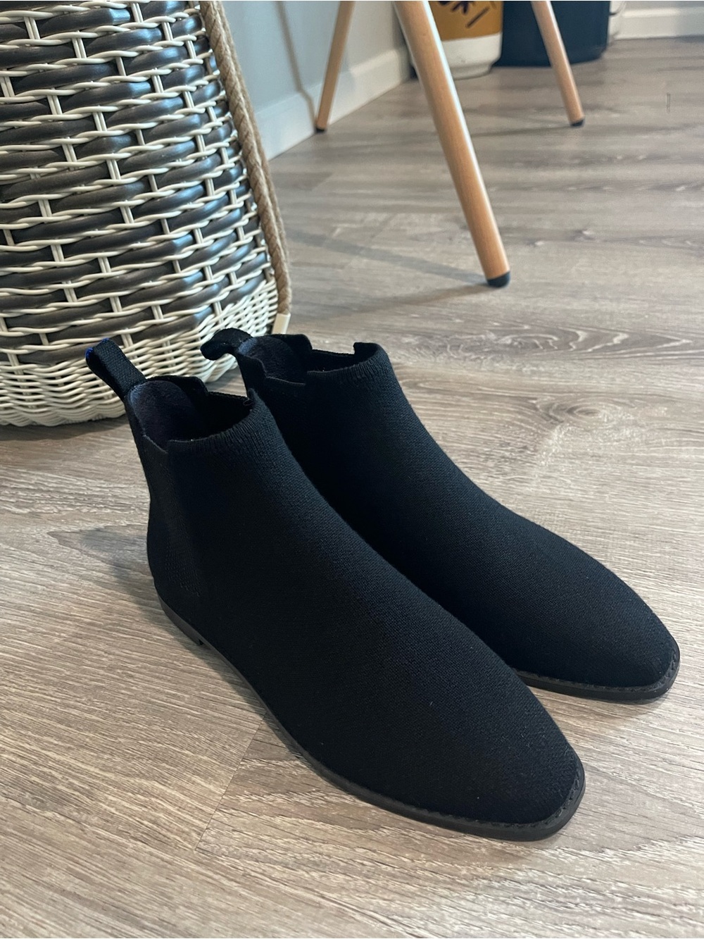 Rothy’s Merino Ankle Boots in onyx black with a distinctive blue pull tab - Picture 8 of 13